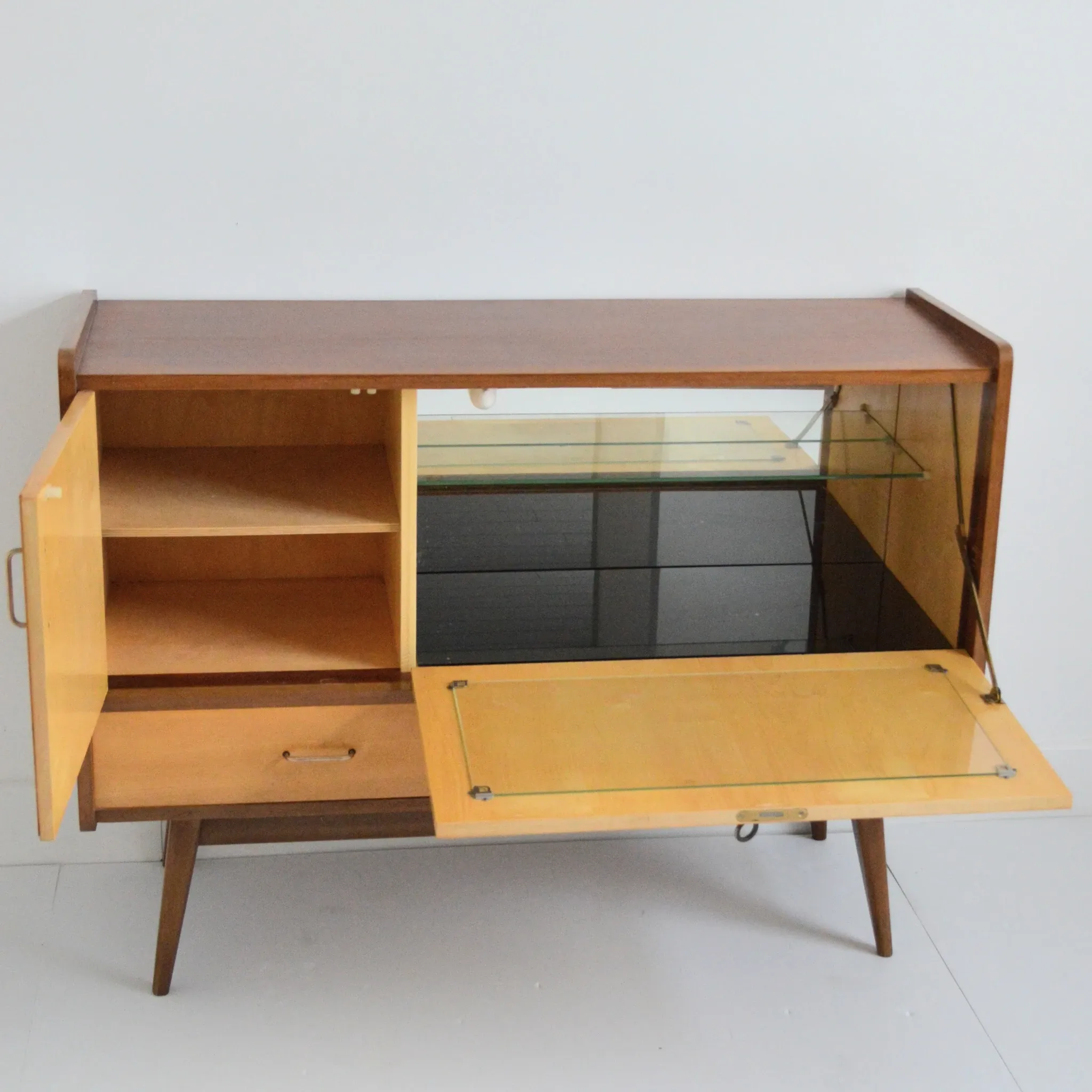 Enfilade / Vintage 1950s bar cabinet with compass legs