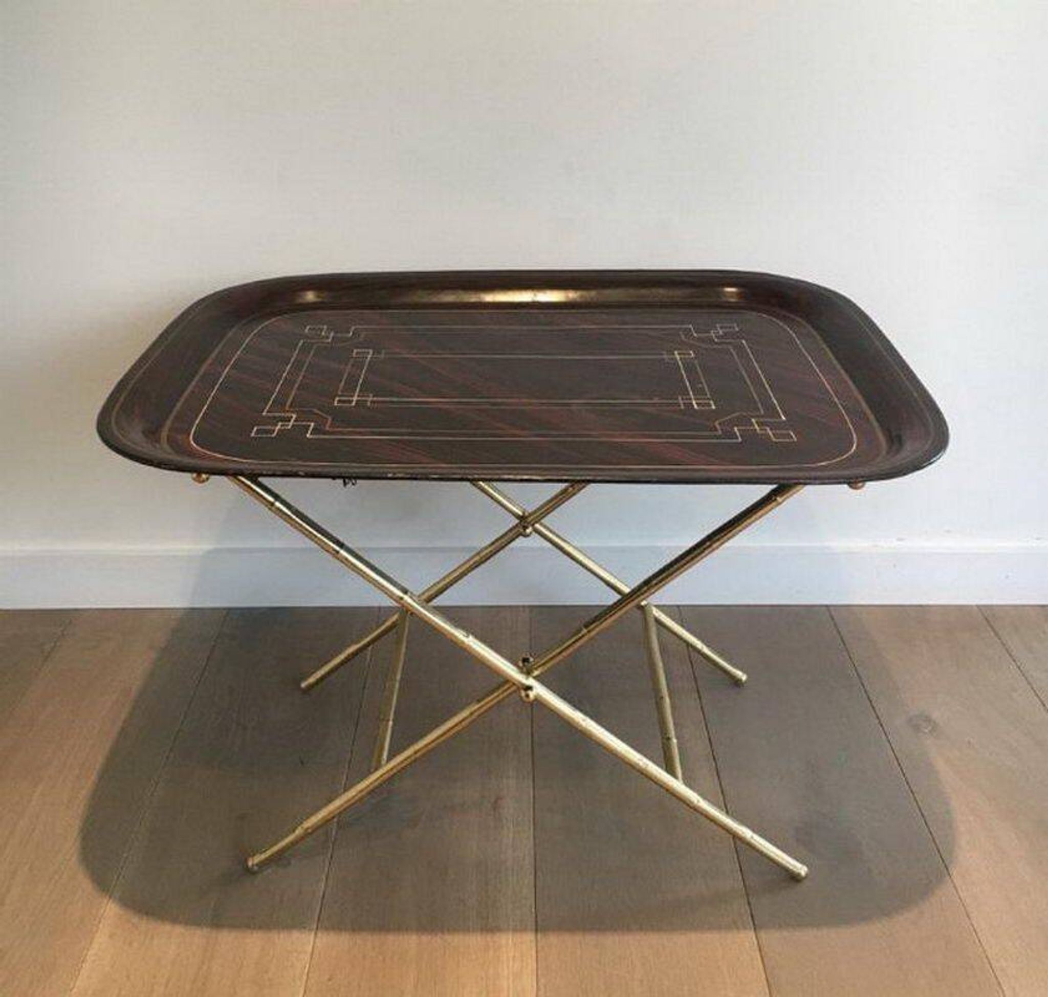 Beautiful table with a brass top and painted sheet metal