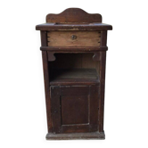Rustic brown pine bedside table with drawer, door, and shelf — early 20th century