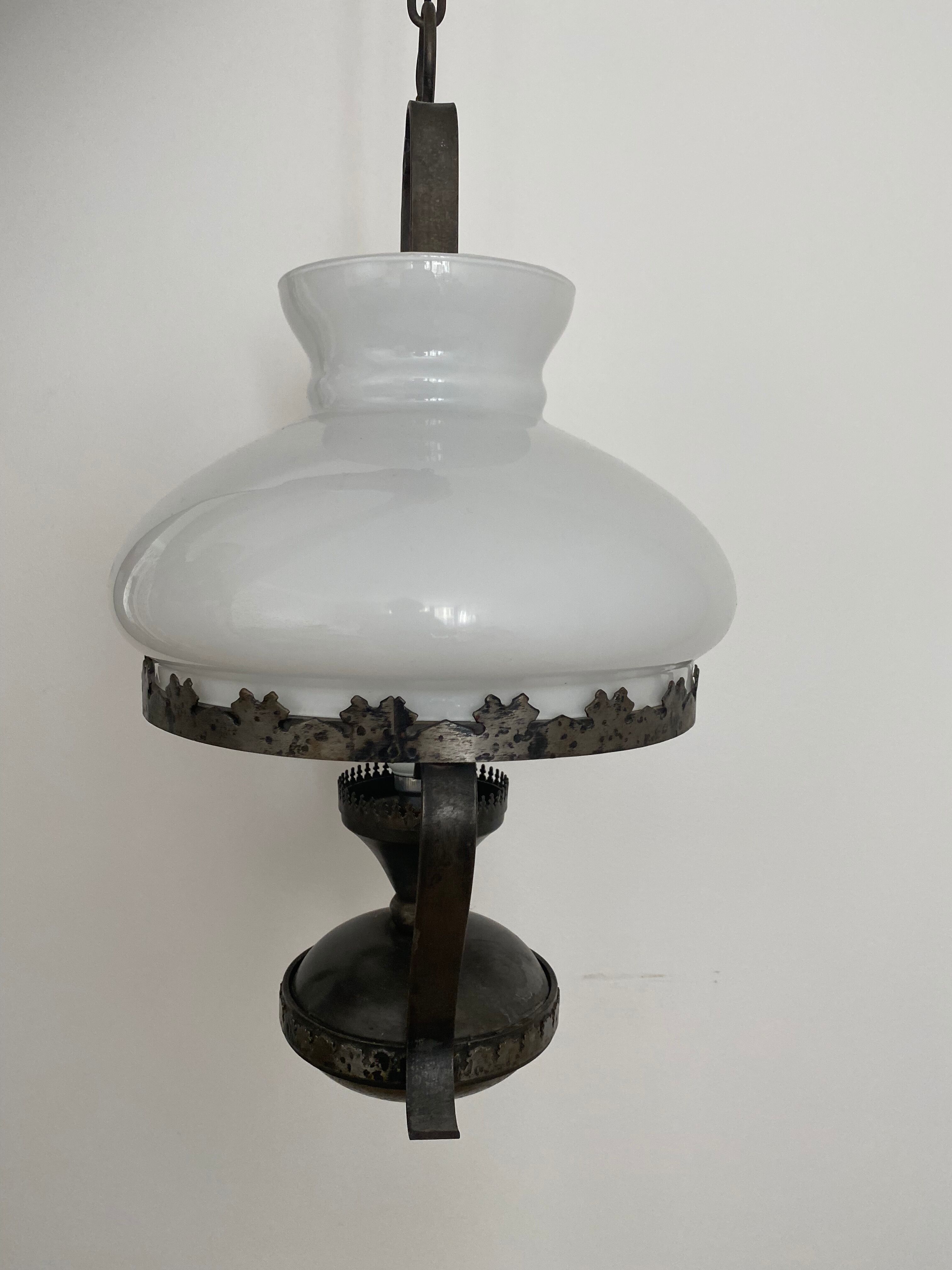 Metal chandelier and opaline glass gloss