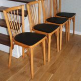 4 BAUMANN N°12 chairs in black skai and light beech