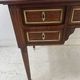 Louis XVI style desk in mahogany and mahogany veneer, 20th century.