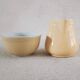 Earthenware cup and milk jar
