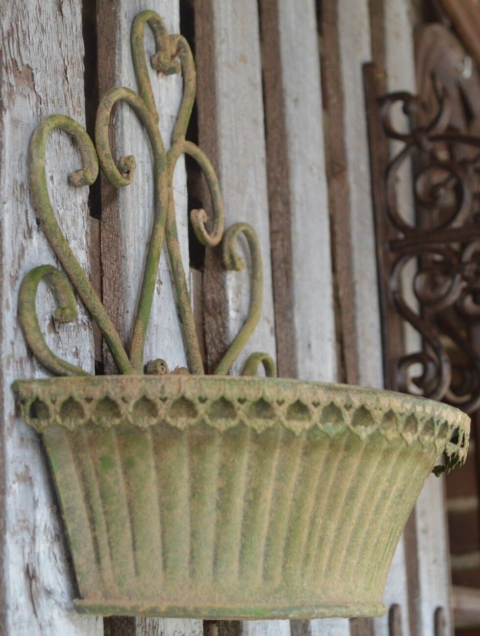 Patinated iron wall planter
