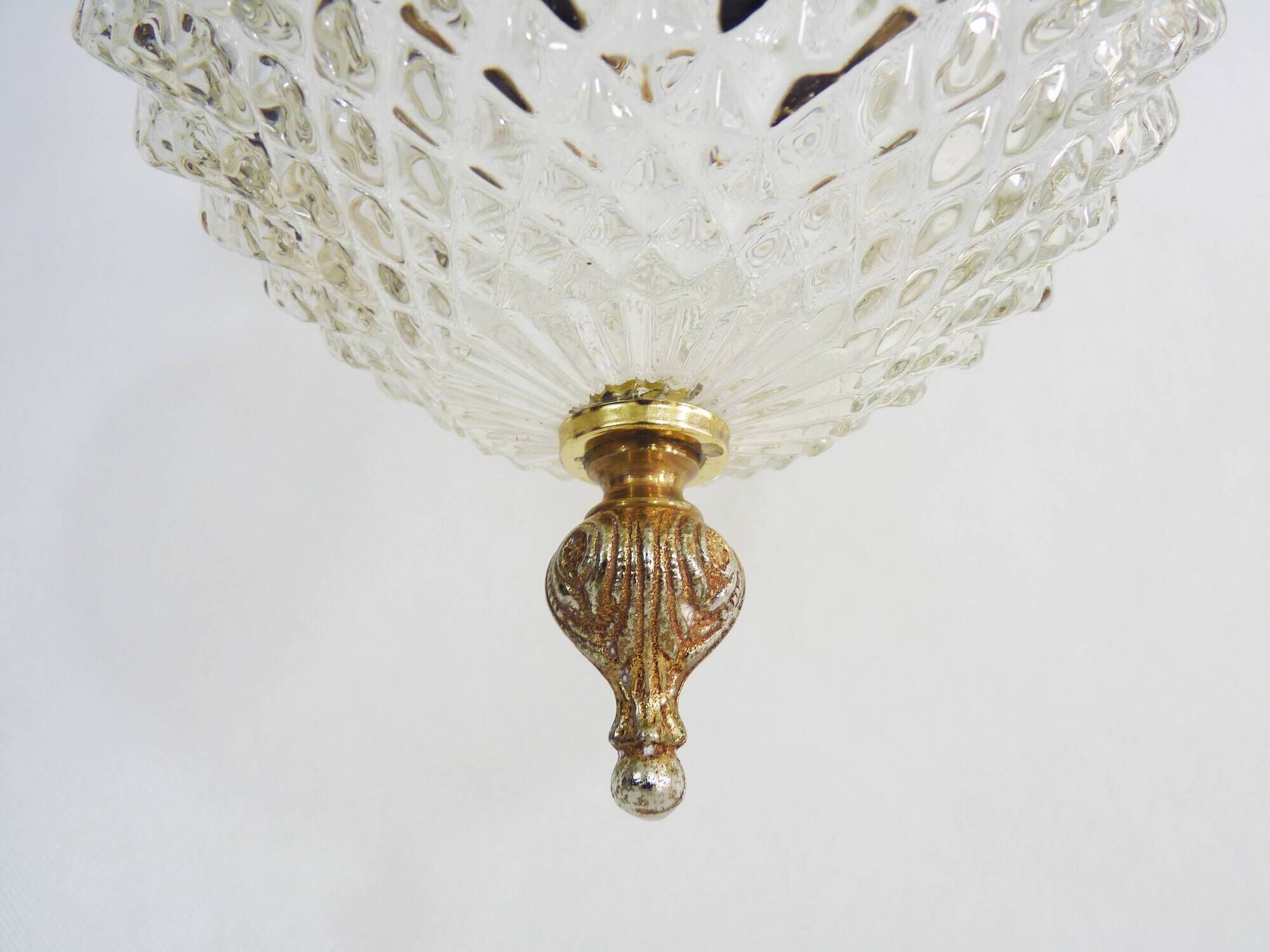 Brass and diamond-tipped chiseled glass globe hanging lamp