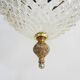 Brass and diamond-tipped chiseled glass globe hanging lamp