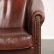 Sheepskin club armchair in English style with brown colour scheme