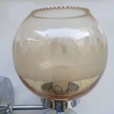 Pair of chrome metal wall lights with vintage sandblasted glass globes