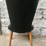 Pair of Baumann model Essor chairs in faux black leather, beech compass footing
