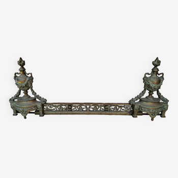 Louis XVI style bronze andirons and fireplace bar