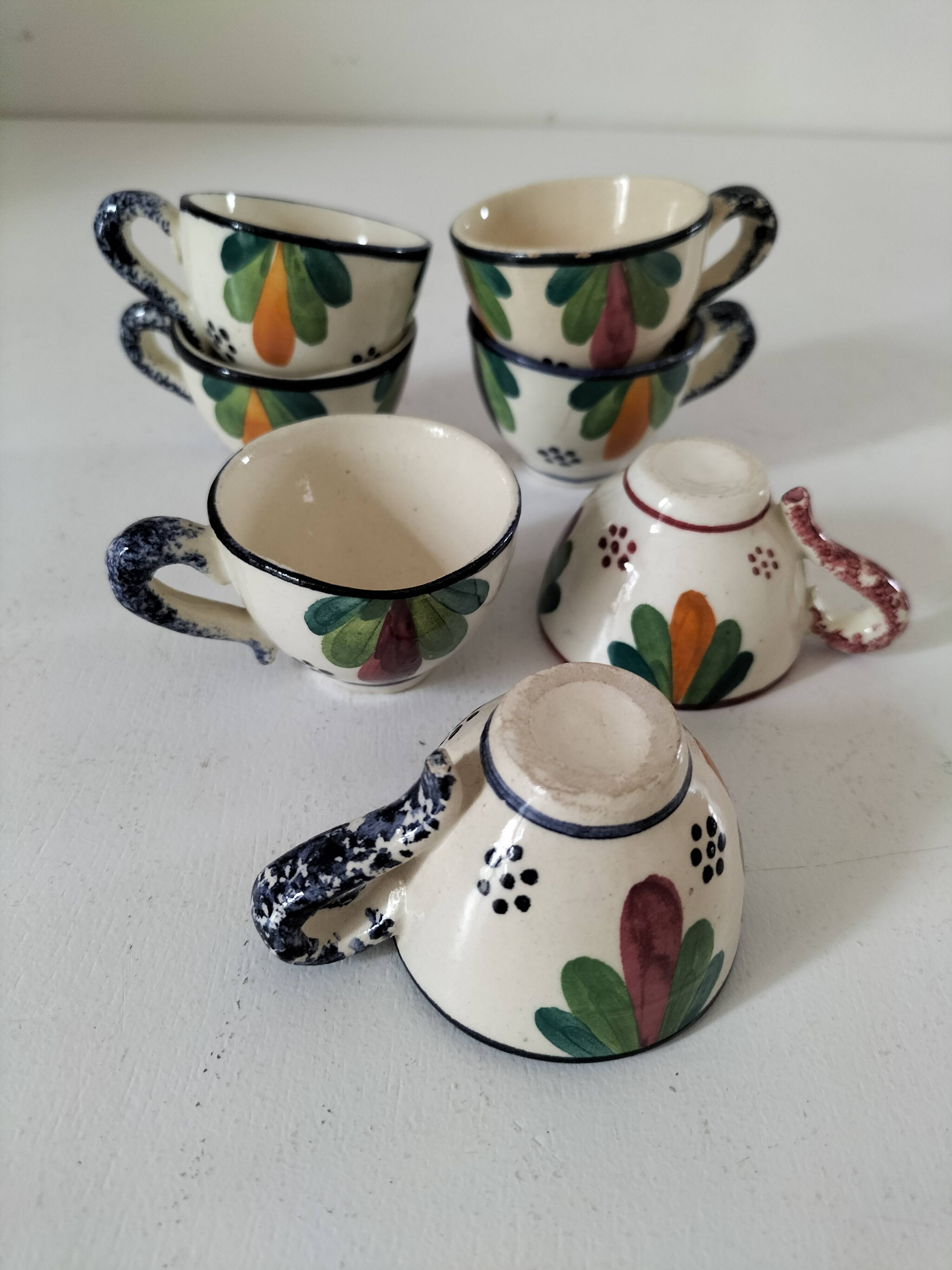 Set of 7 miniature Quimper earthenware cups