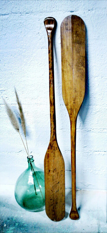 Pair of old wooden oars