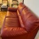 Set convertible leather sofa and footrest Natuzzi