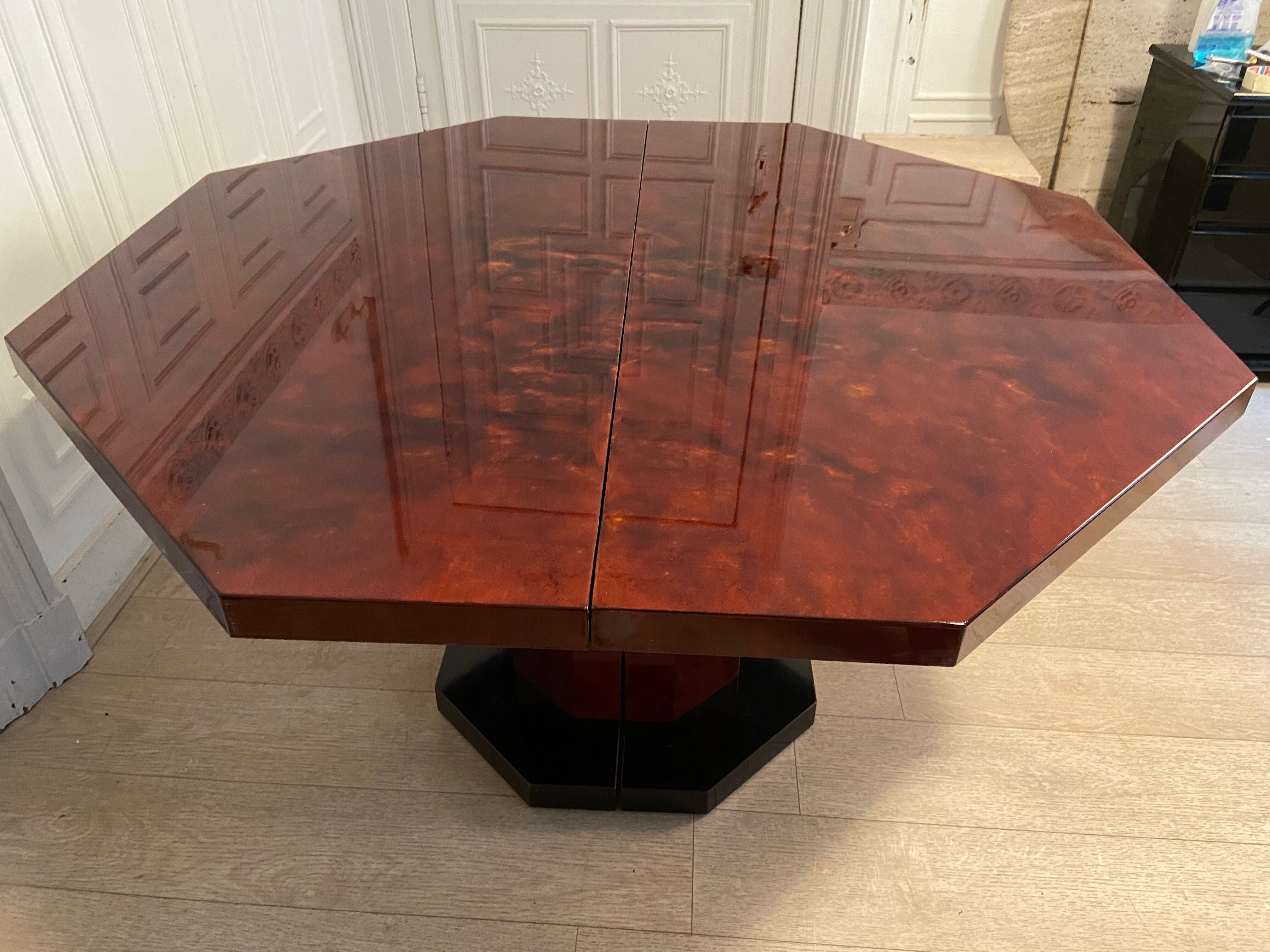 Red lacquered dining table and gold dust, 1970s