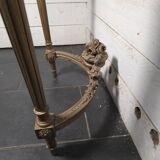 Louis XVI style console in gilded wood with a marble top.