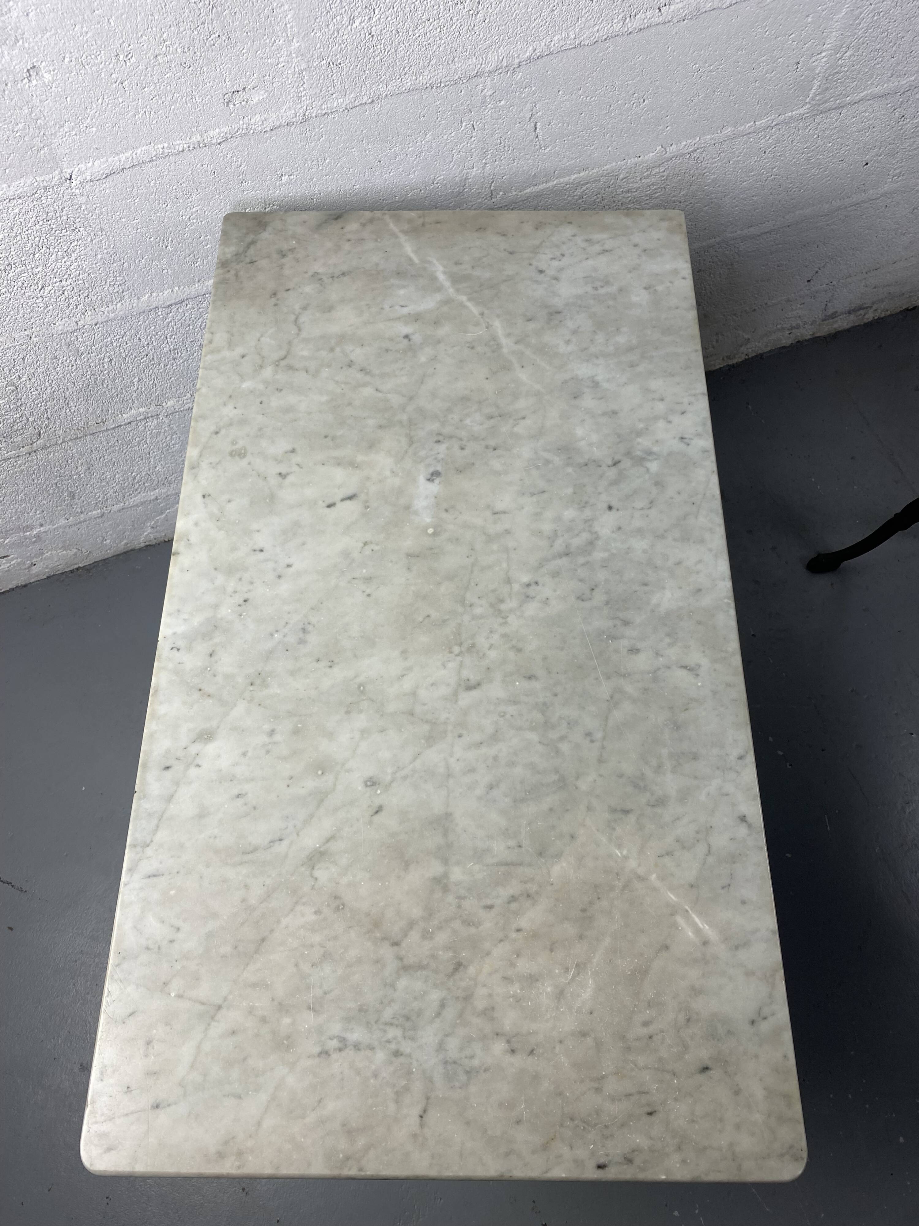 Set of two bistro tables in marble and wrought iron