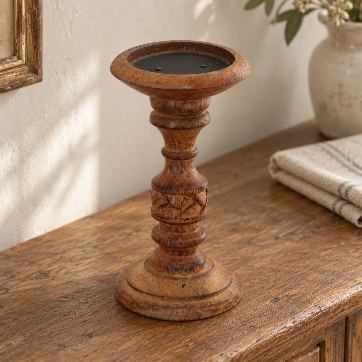 Turned and carved wooden candlestick with foliage decoration – H 20 cm