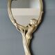 Old vanity mirror/hand face mirror/nude of a woman, naiad. art nouveau style. brass. 25 x 11 cm