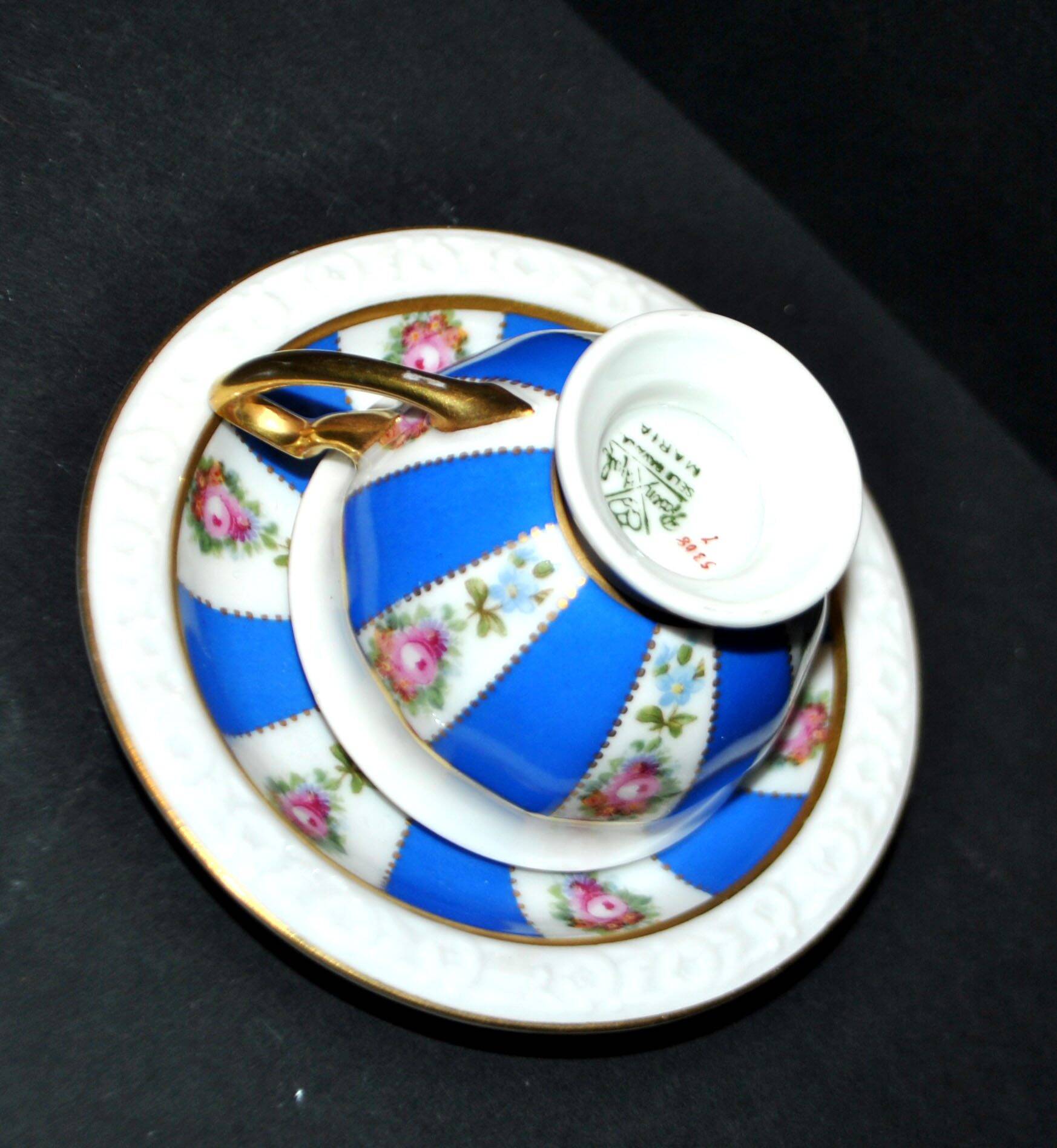 Maria collector's cup in blue and gold German porcelain.