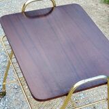 Side table of the 60s mahogany and gold metal range discs
