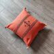 Handmade orange Berber cotton cushion