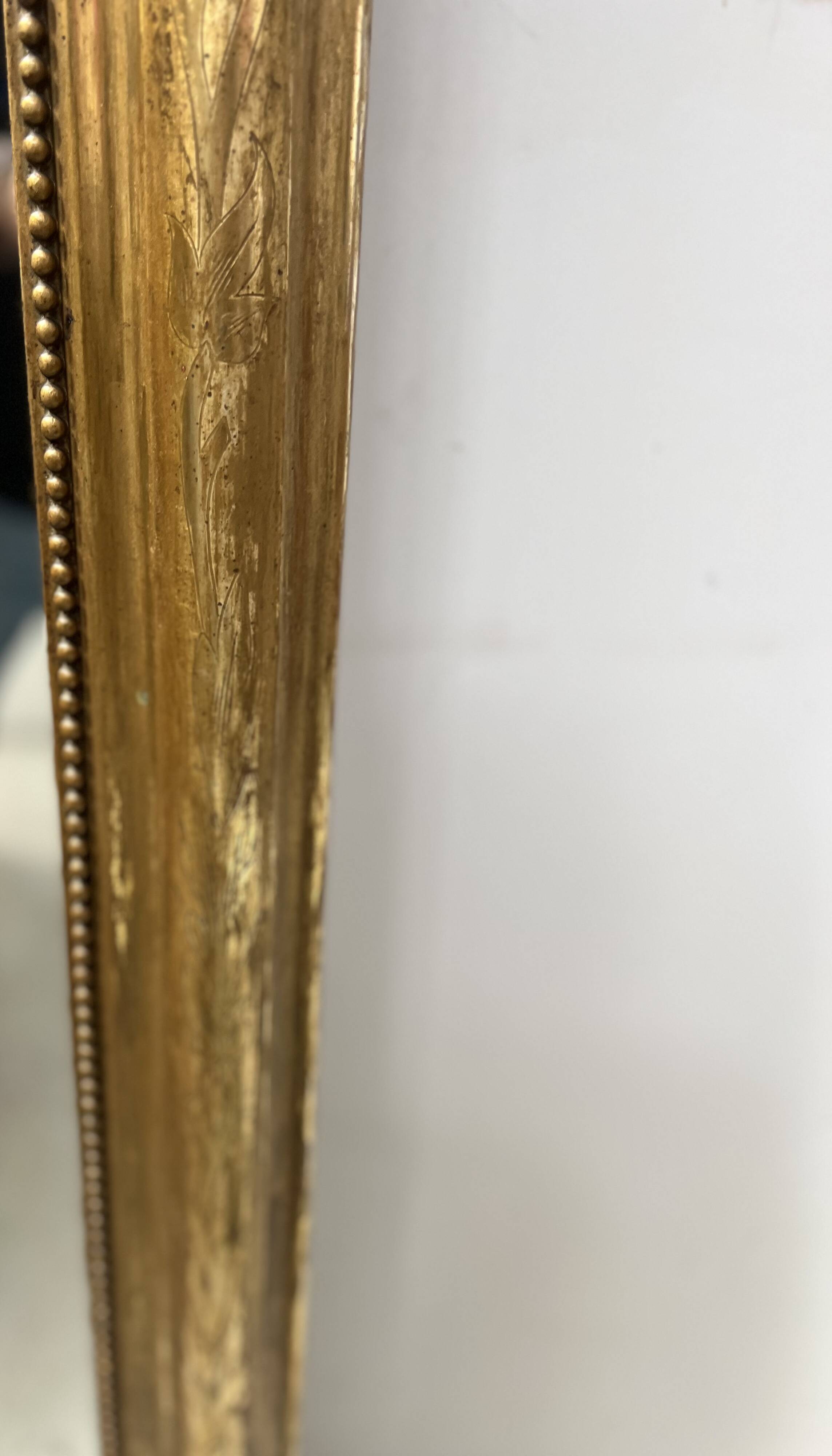 Louis Philippe mirror in wood and gilded stucco, 19th century