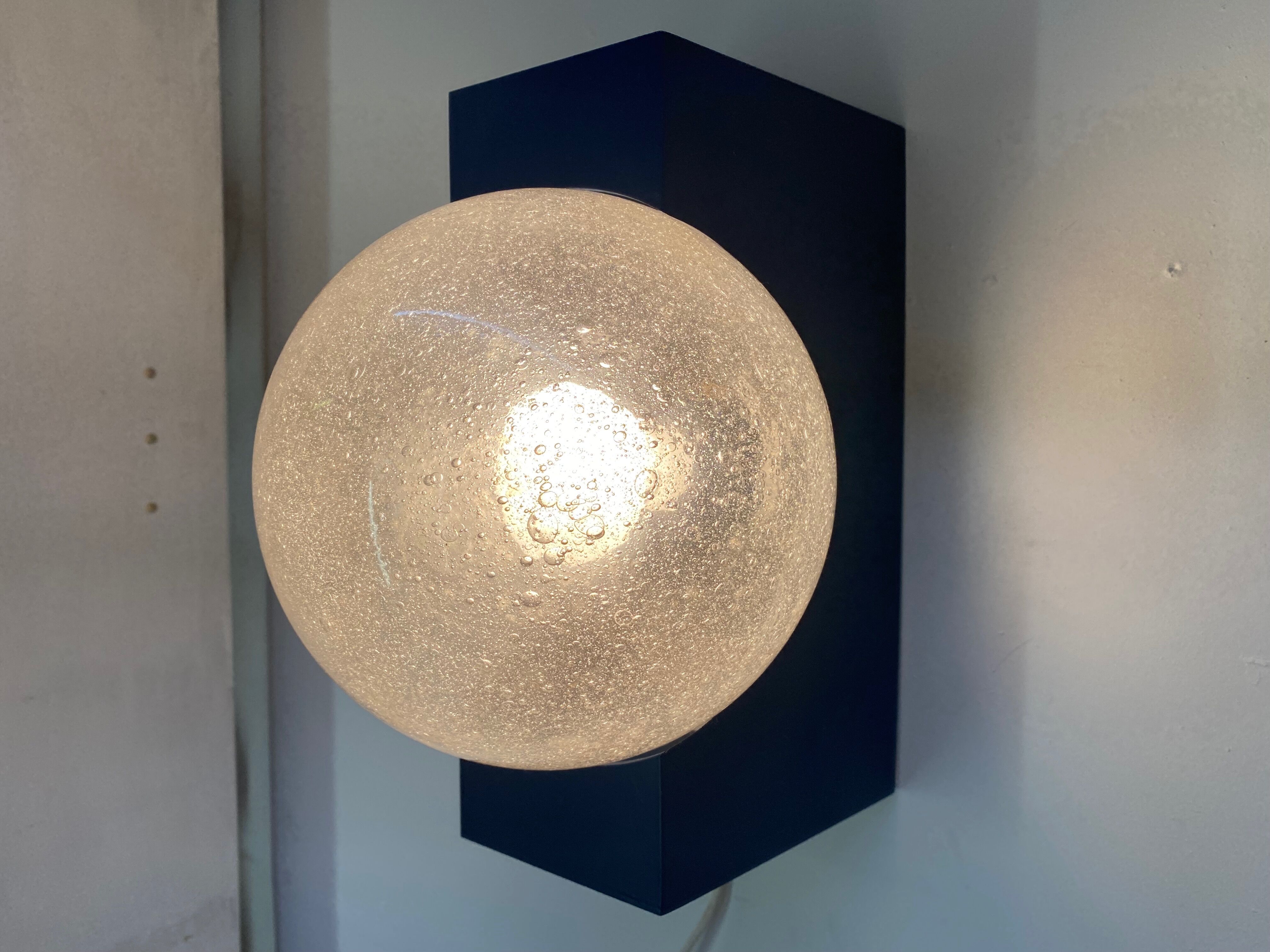 Vintage wall lamp by Raak design 1960