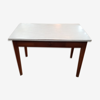 Small kitchen table on white formica