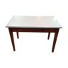 Small kitchen table on white formica