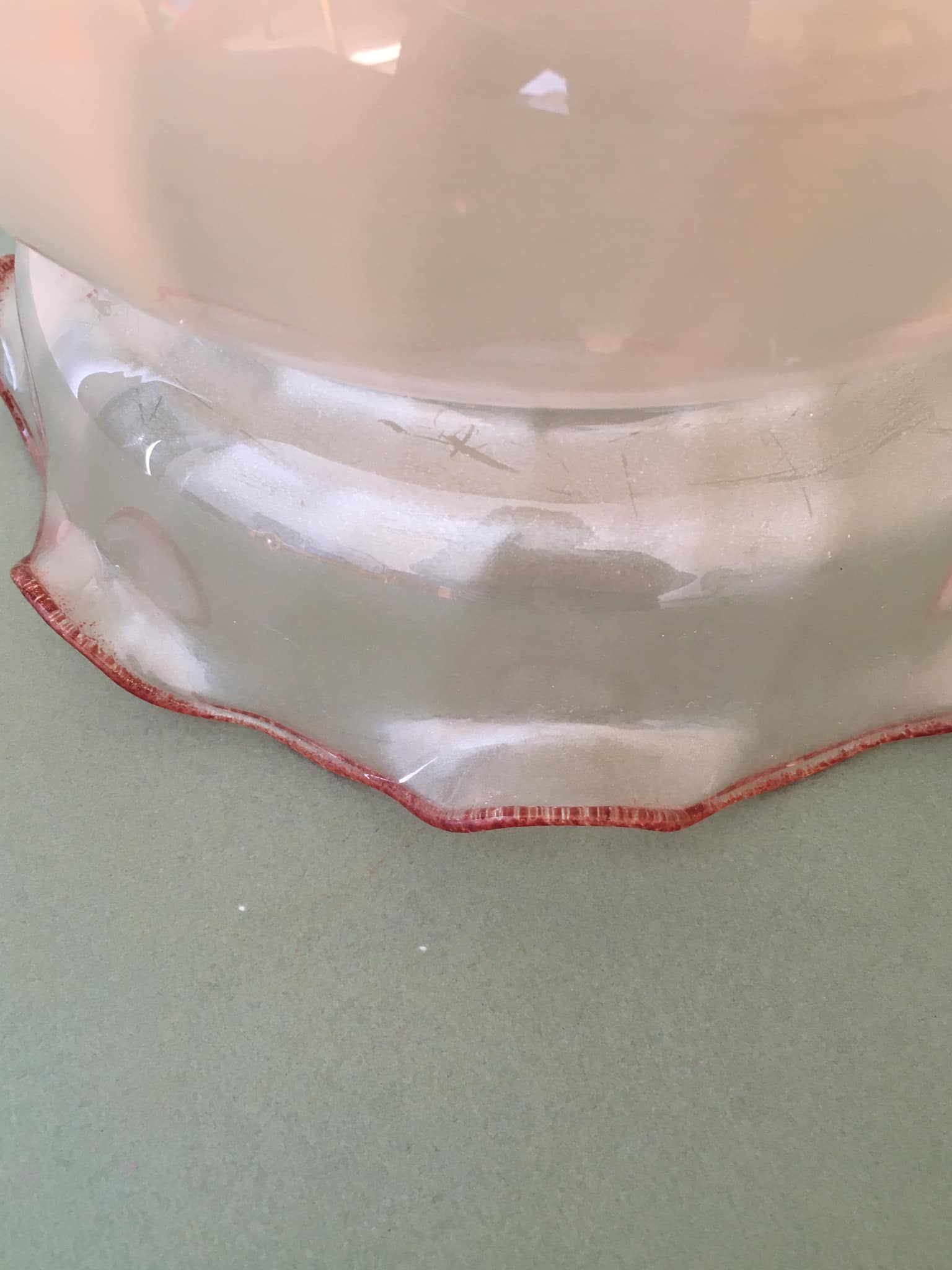 Peach-colored transparent glass collar globe