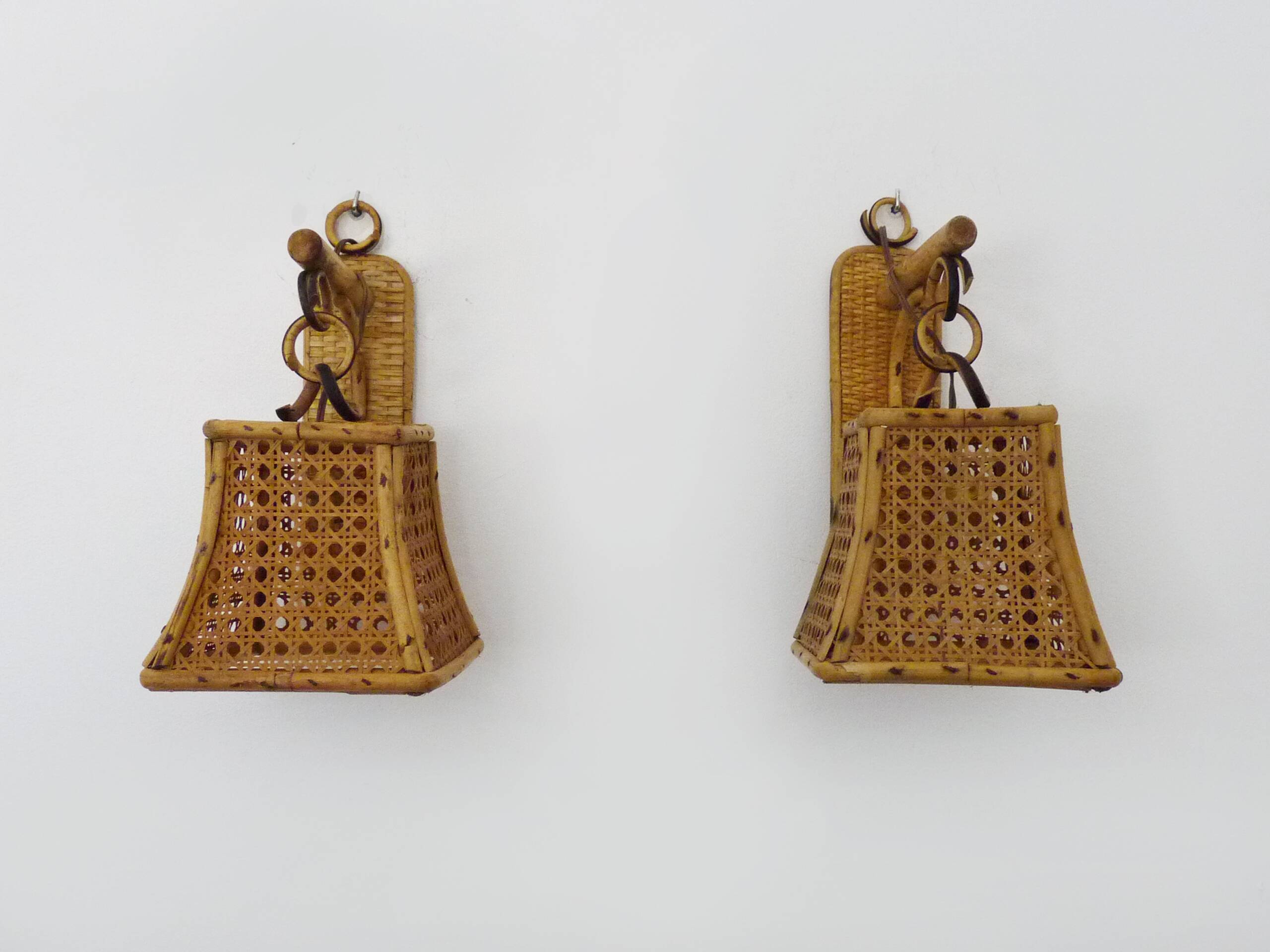 Pair of rattan and cane lantern wall lights. 1950s-1960s