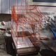 Old red metal birdcage