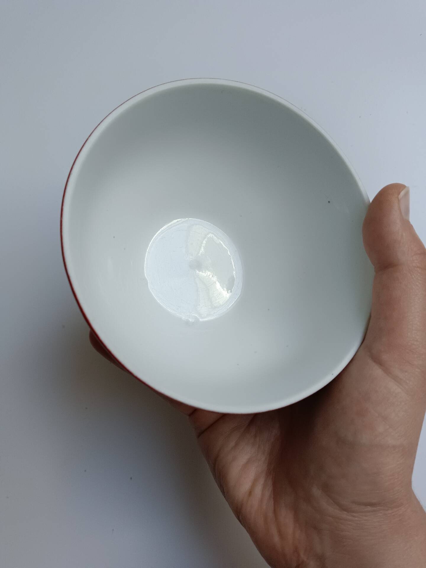 Red bowl with white polka dots in Longchamp ceramic