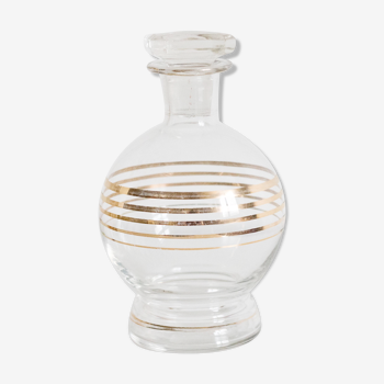 Glass vitage decanter and gilded edge