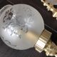 Pair of wall lamps in gilded metal and frosted glass art deco style