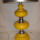 Lampe jaune au contour inox des années 1970