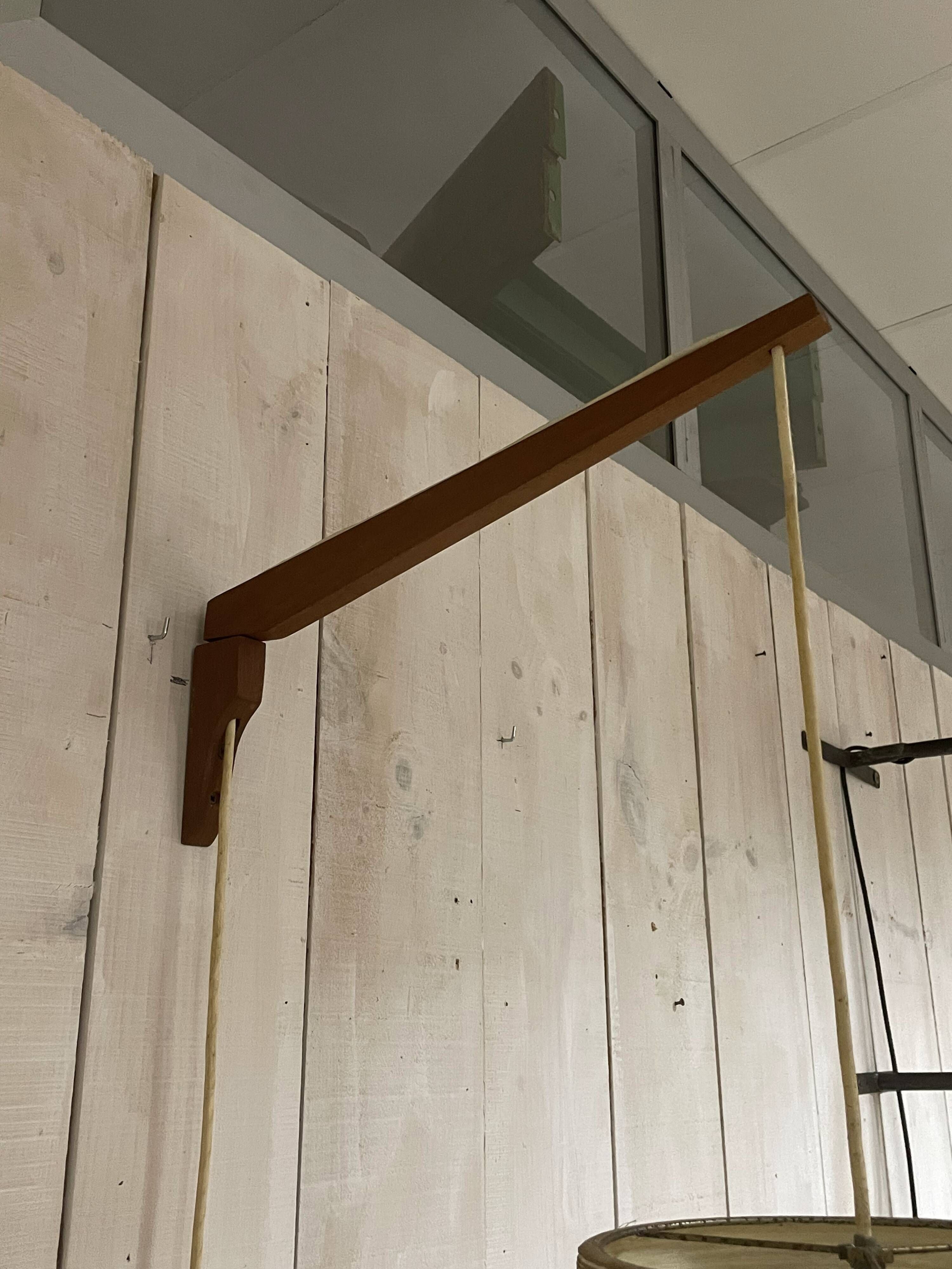Rare teak and sisal wall lamp from the 1960s, attributed to Lotte Bostlund.