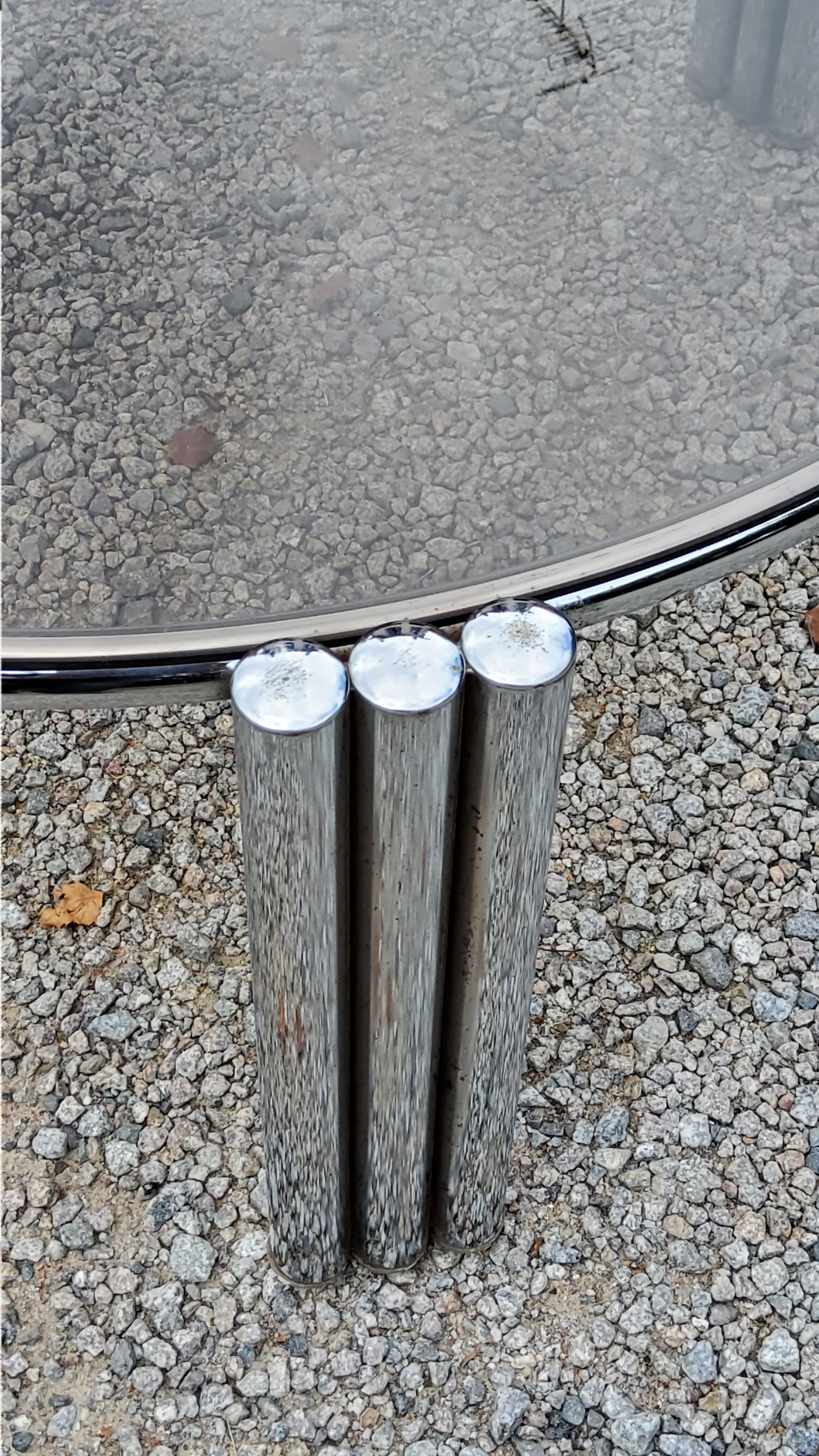 Coffee table design of the 70s smoked glass base chrome Diameter 84cm
