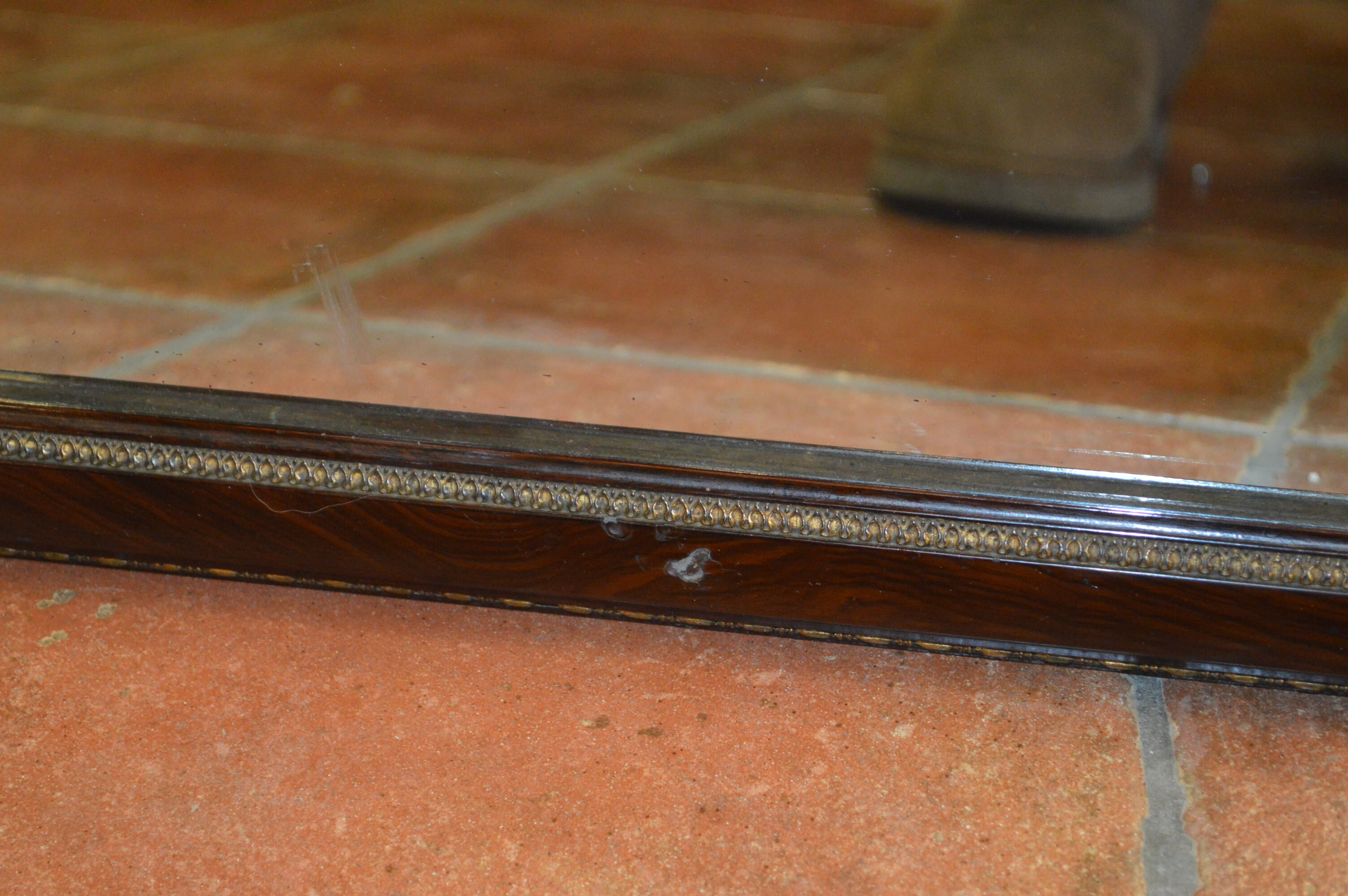 Mirror style restoration enhances brass mahogany