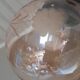 Vintage globe suspension in amber glass, chiseled floral decoration - 80s