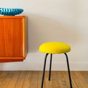 Black iron tripod stool with boiled wool, yellow, 1960.