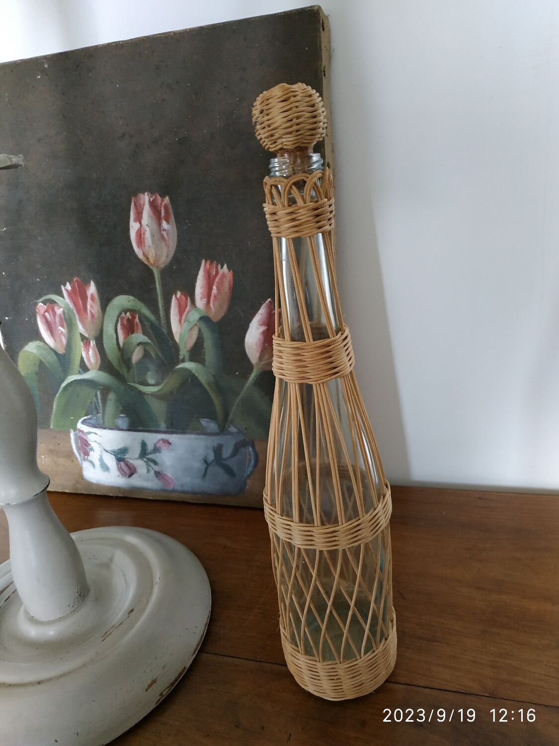 Glass and rattan bottle