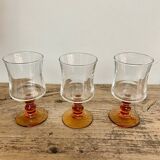6 small amber stemmed glasses