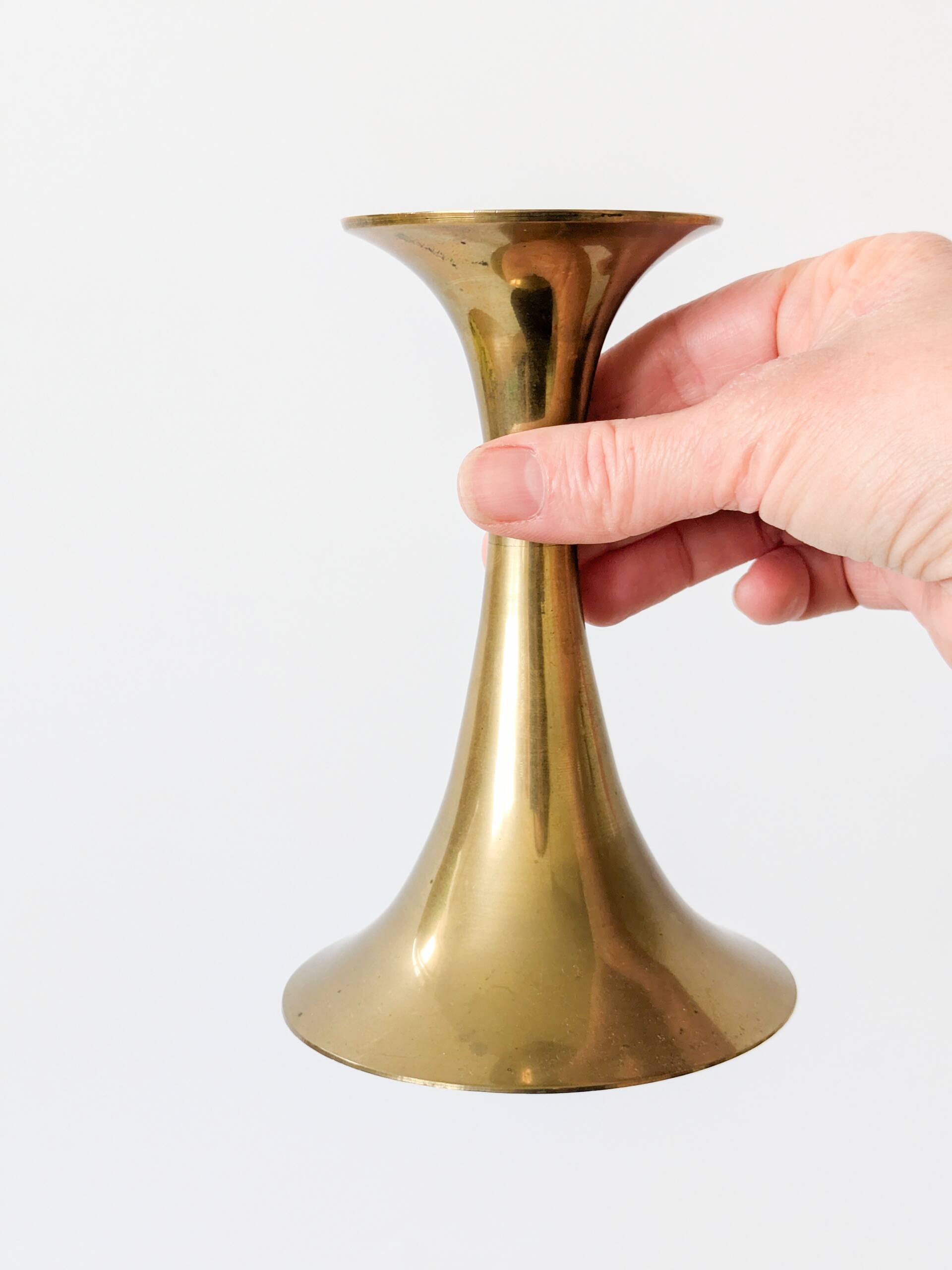Pair of Midcentury brass candlesticks, flared shape.