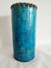 Vase rouleau à glaçure bleue signé Triki