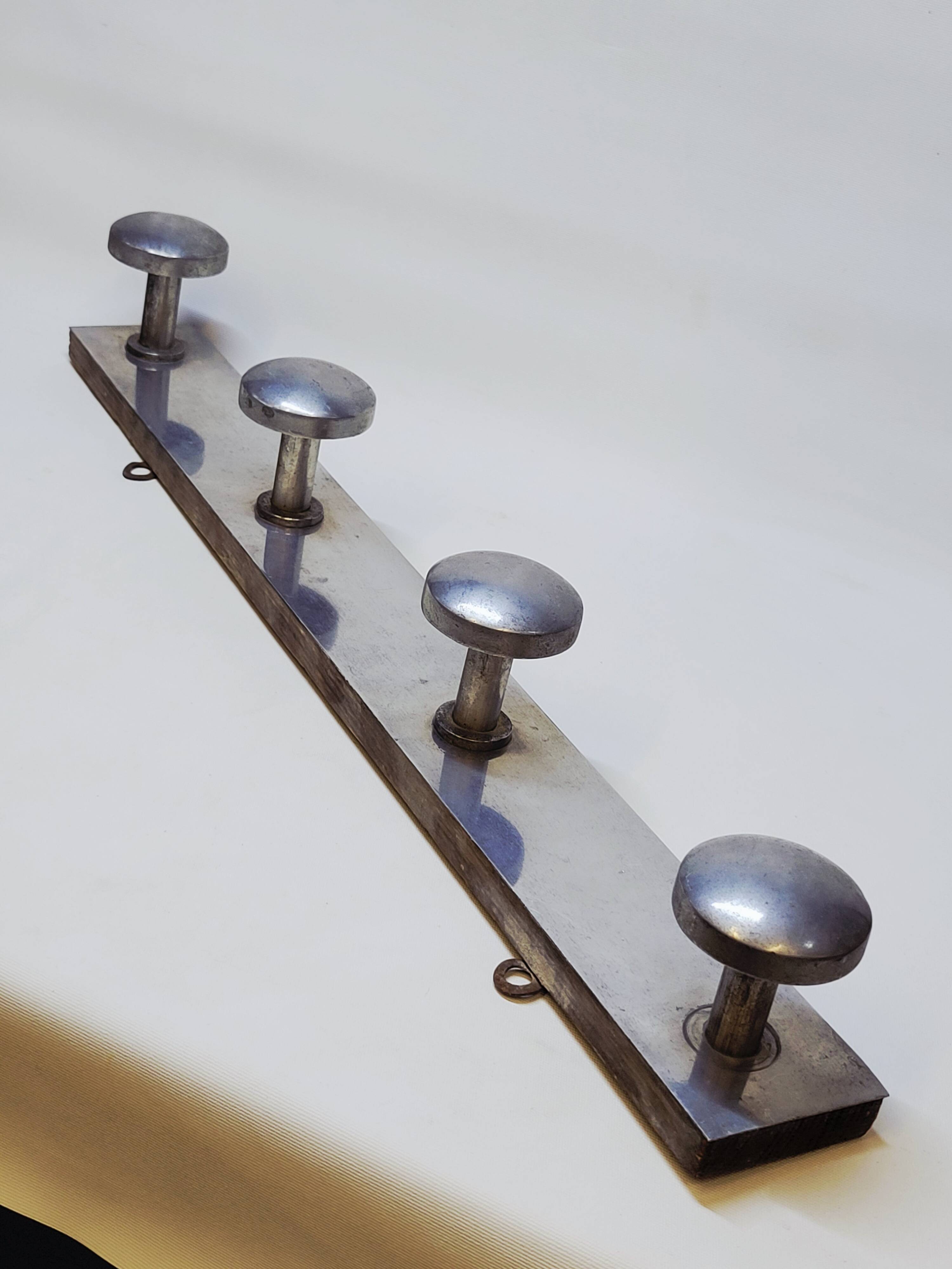 Retro vintage coat rack with 4 aluminum hooks on a wooden frame