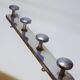 Retro vintage coat rack with 4 aluminum hooks on a wooden frame