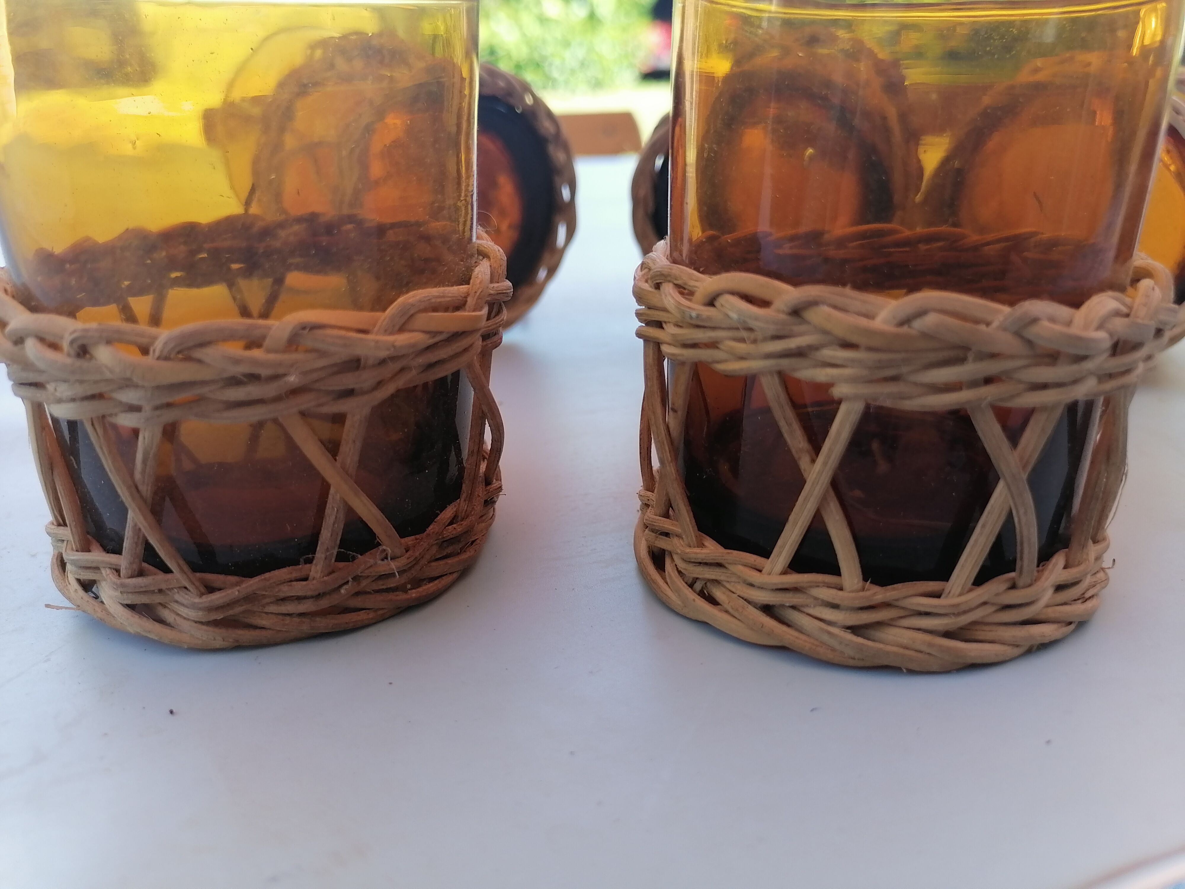 6 small glasses Amber Blown Glass garnished wicker 1 cracked