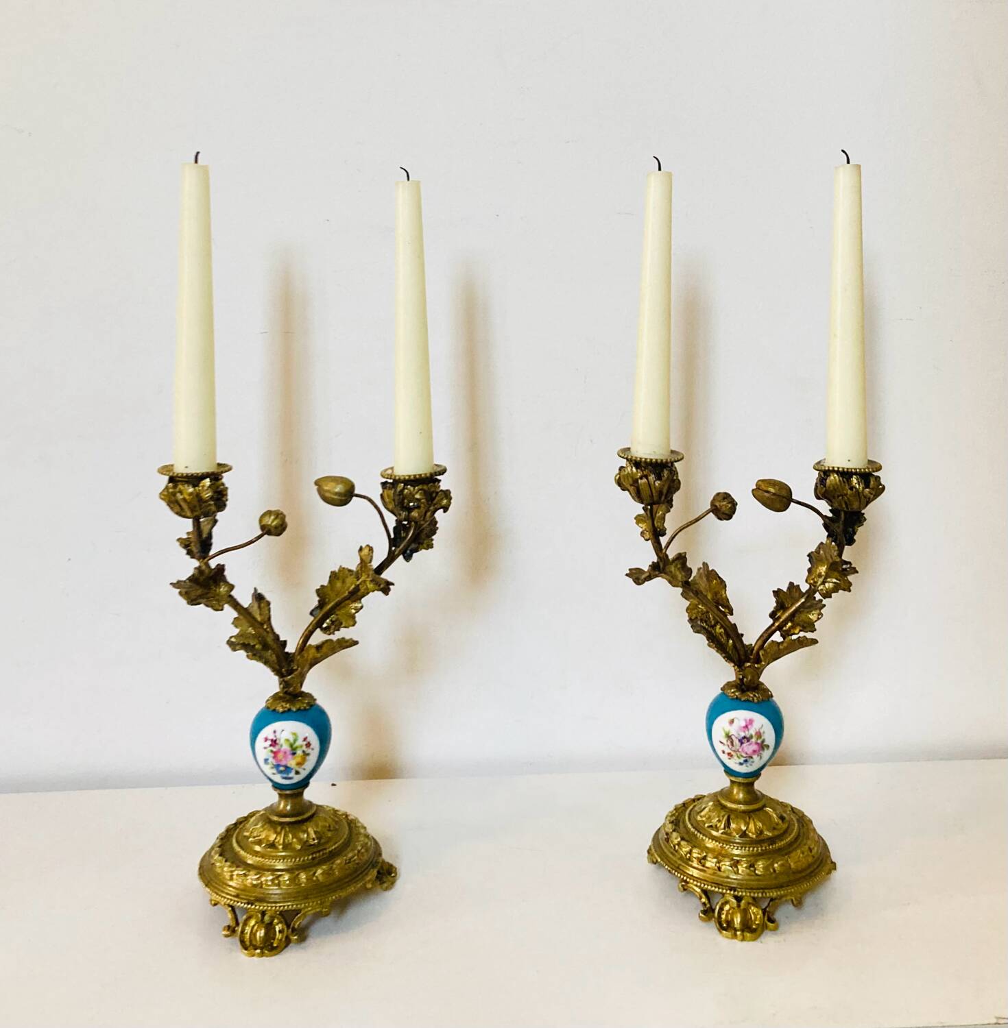 19th century candle holders in gilded bronze and porcelain