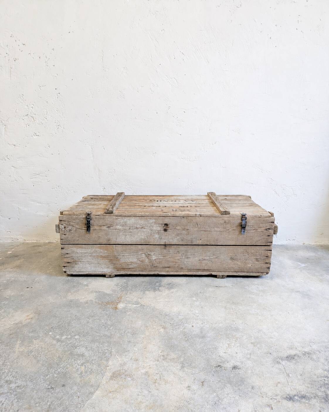 Antique patinated wooden chest – coffee table